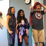 Three young students laughing in acting class