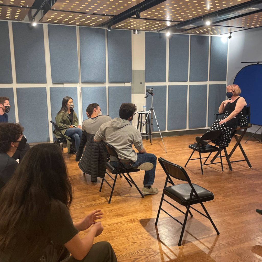 Casting director Deb Dion working with adult acting students in a workshop